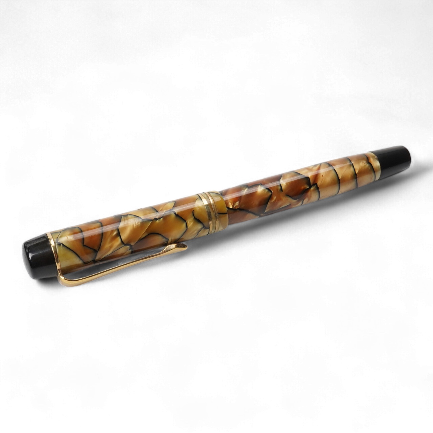 A Montblanc black and pearl fountain pen marked No.322 button filler